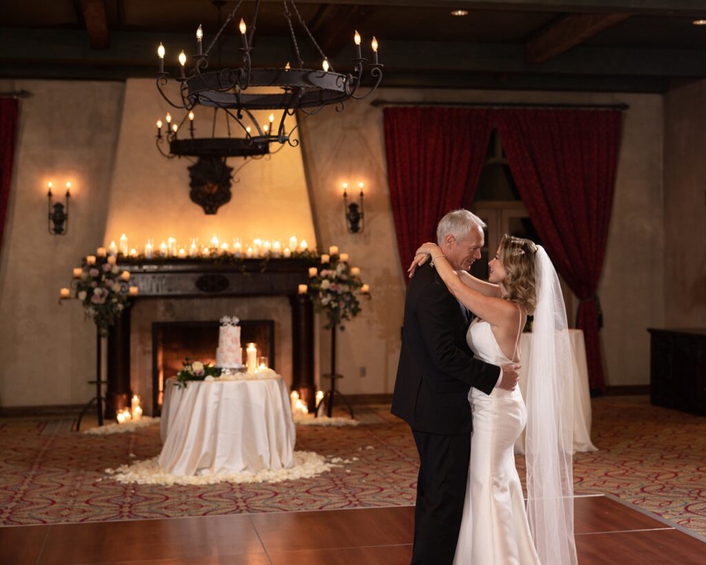 First dance during candlelight wedding at the Royal Palms Resort and Spa